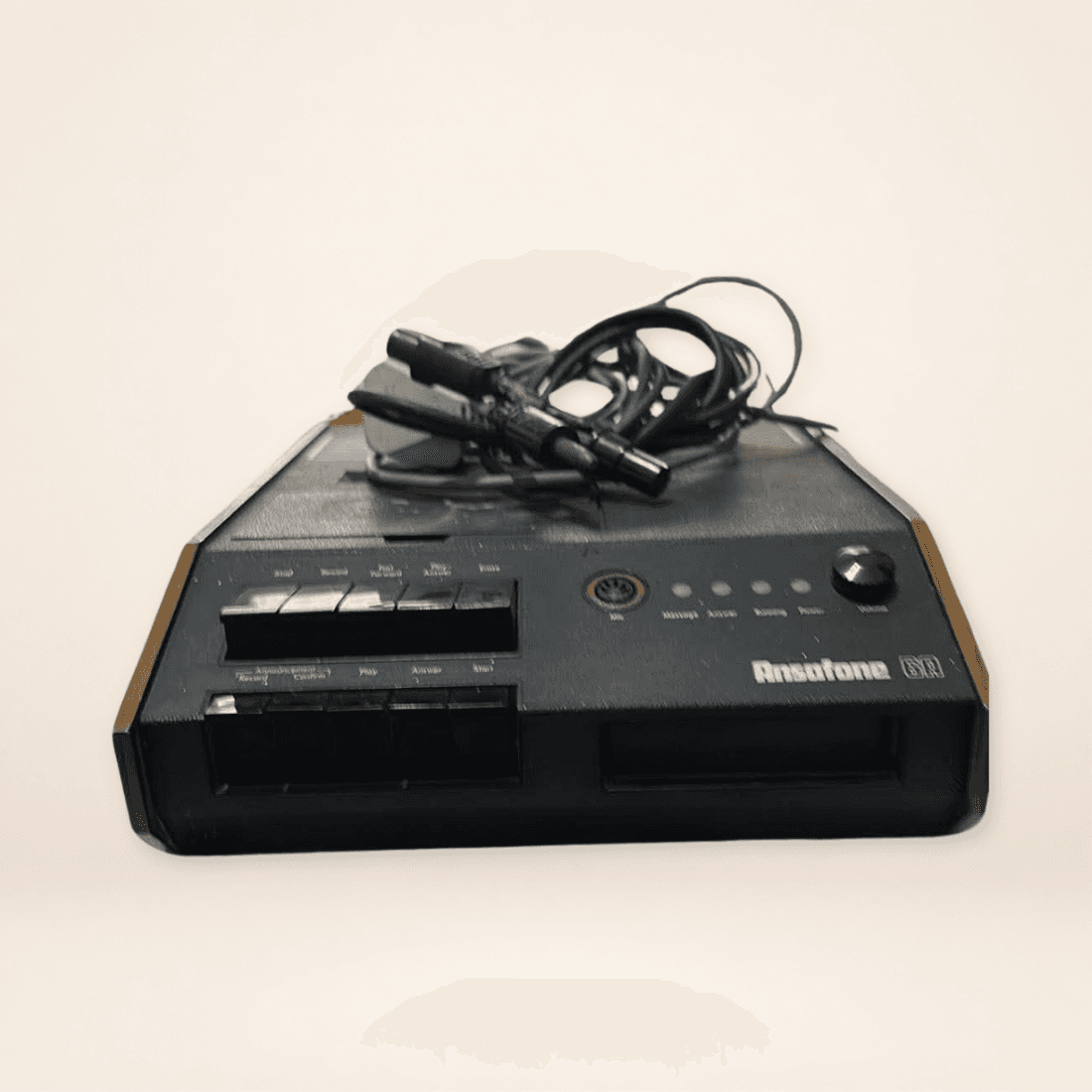 Front view of Ansafone 6A answering machine with period leads resting on top