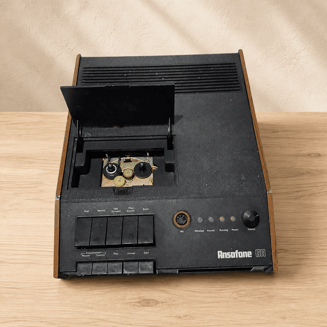 Ansafone 6A vintage answering machine displayed with the tape compartment open