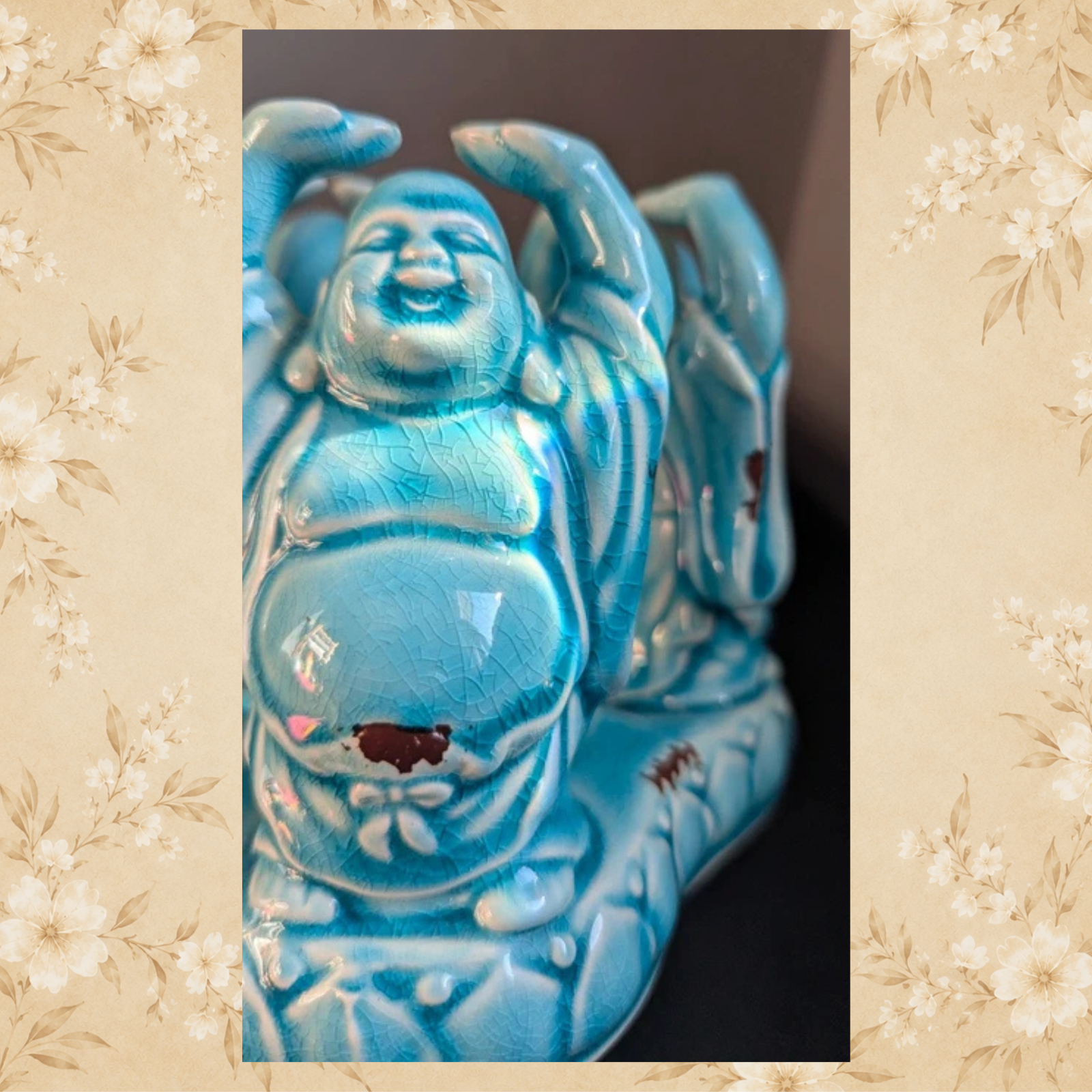 Close side view of vintage turquoise Laughing Buddha ceramic figure
