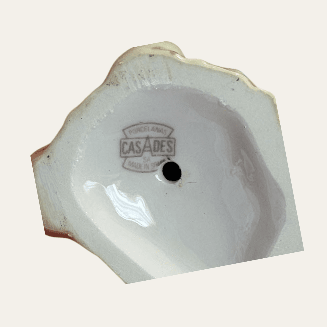 Porcelanas Casades Made in Spain mark on the underside, with visible marks around the foot rim