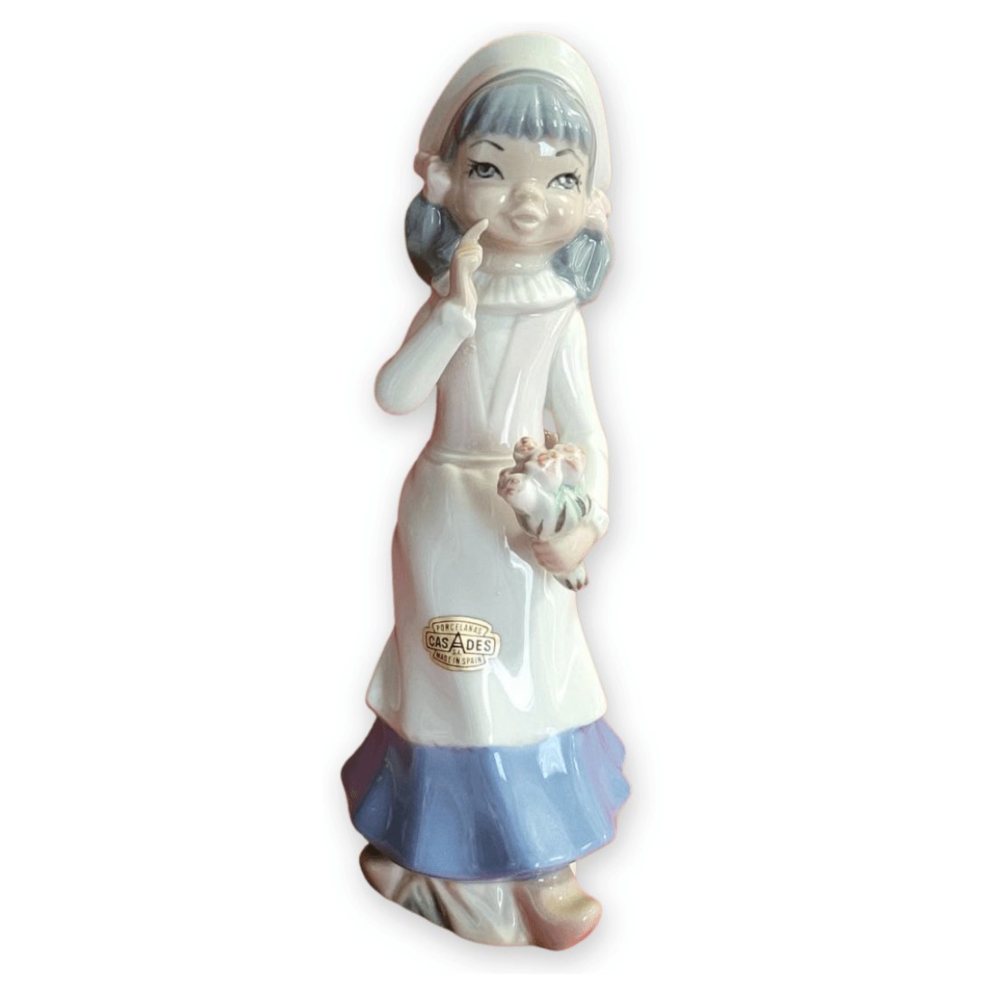 Casades girl with flowers porcelain figurine full-length view