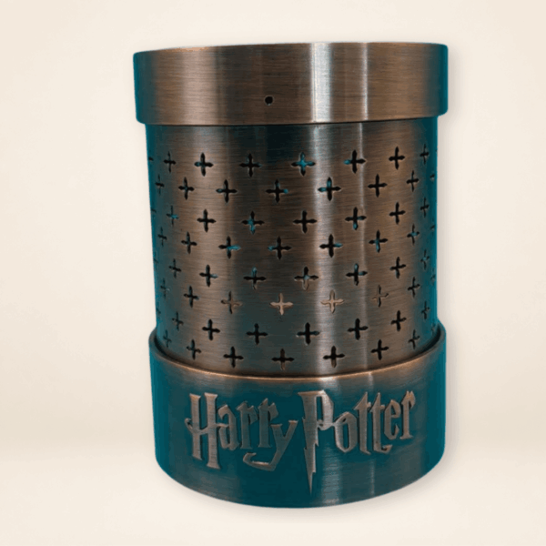 Harry Potter Potion Lava Lamp Base by ABYstyle with bronze-tone perforated metal body and raised Harry Potter logo