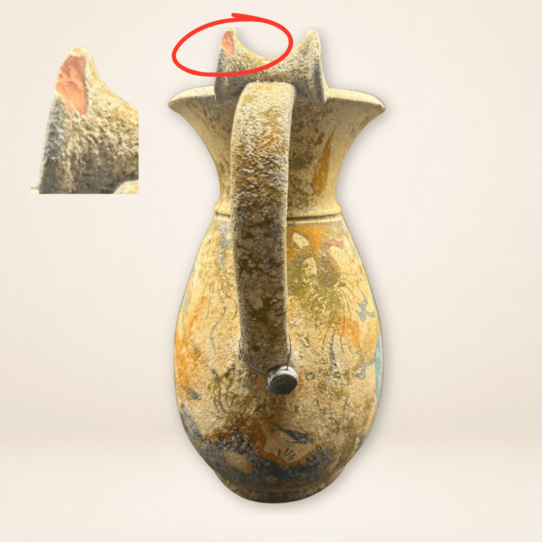 Back view of Minoan style pottery jug showing chip to upper rim