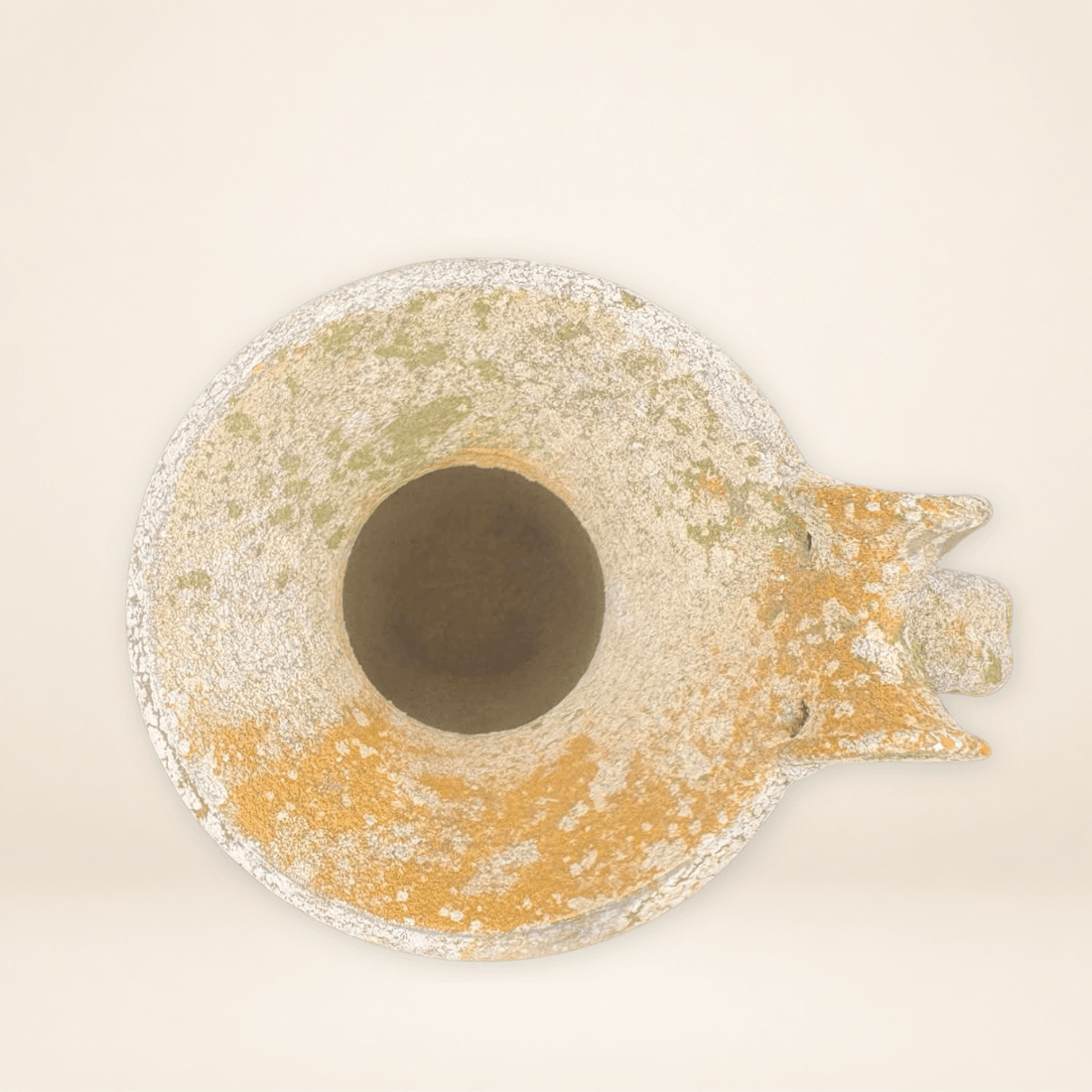 Top view of vintage Minoan style pottery jug showing flared rim and interior