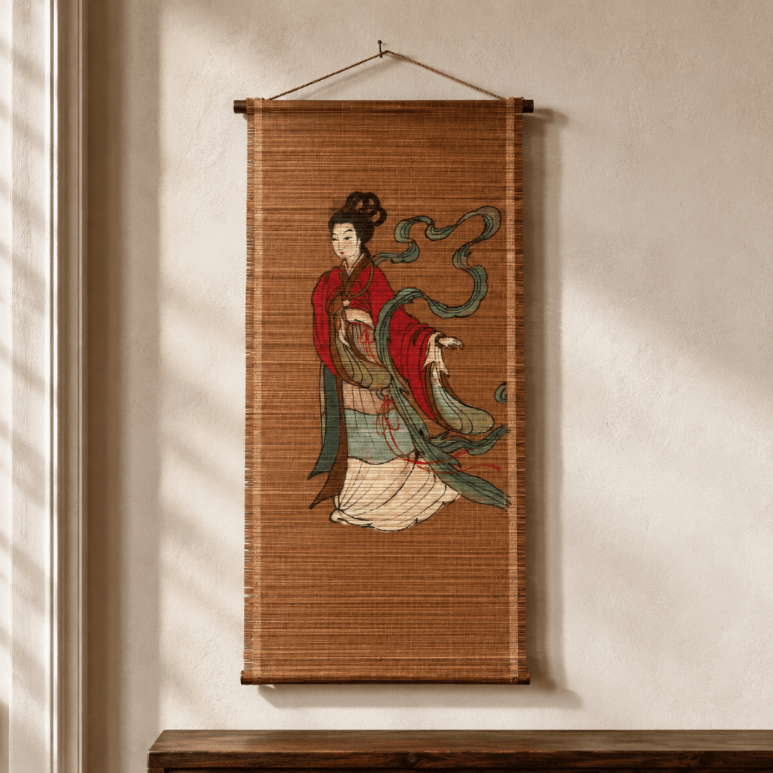 Vintage bamboo wall hanging with Asian woman displayed on a neutral interior wall