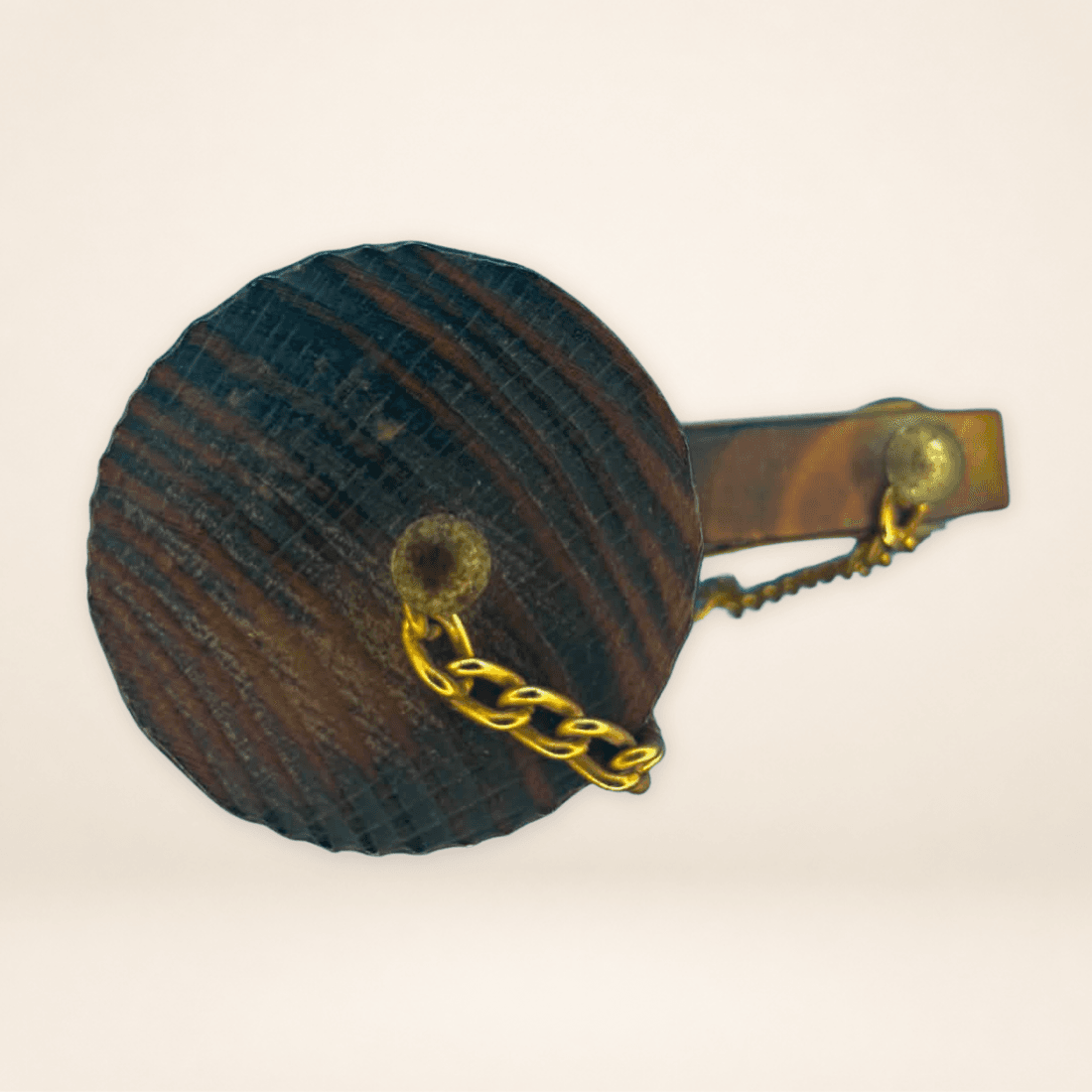 Top view of vintage Spanish leather decanter showing the wooden stopper, gold-tone chain and handle