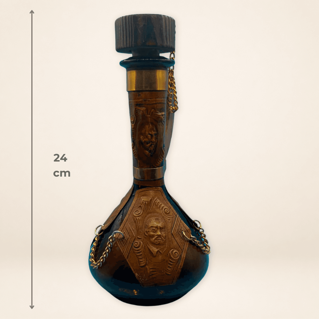 Vintage Spanish leather decanter shown with its approximate 24 cm height