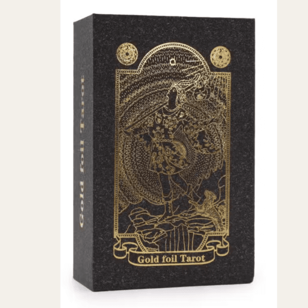 Gold foil tarot card set in a black gift box with gold artwork.