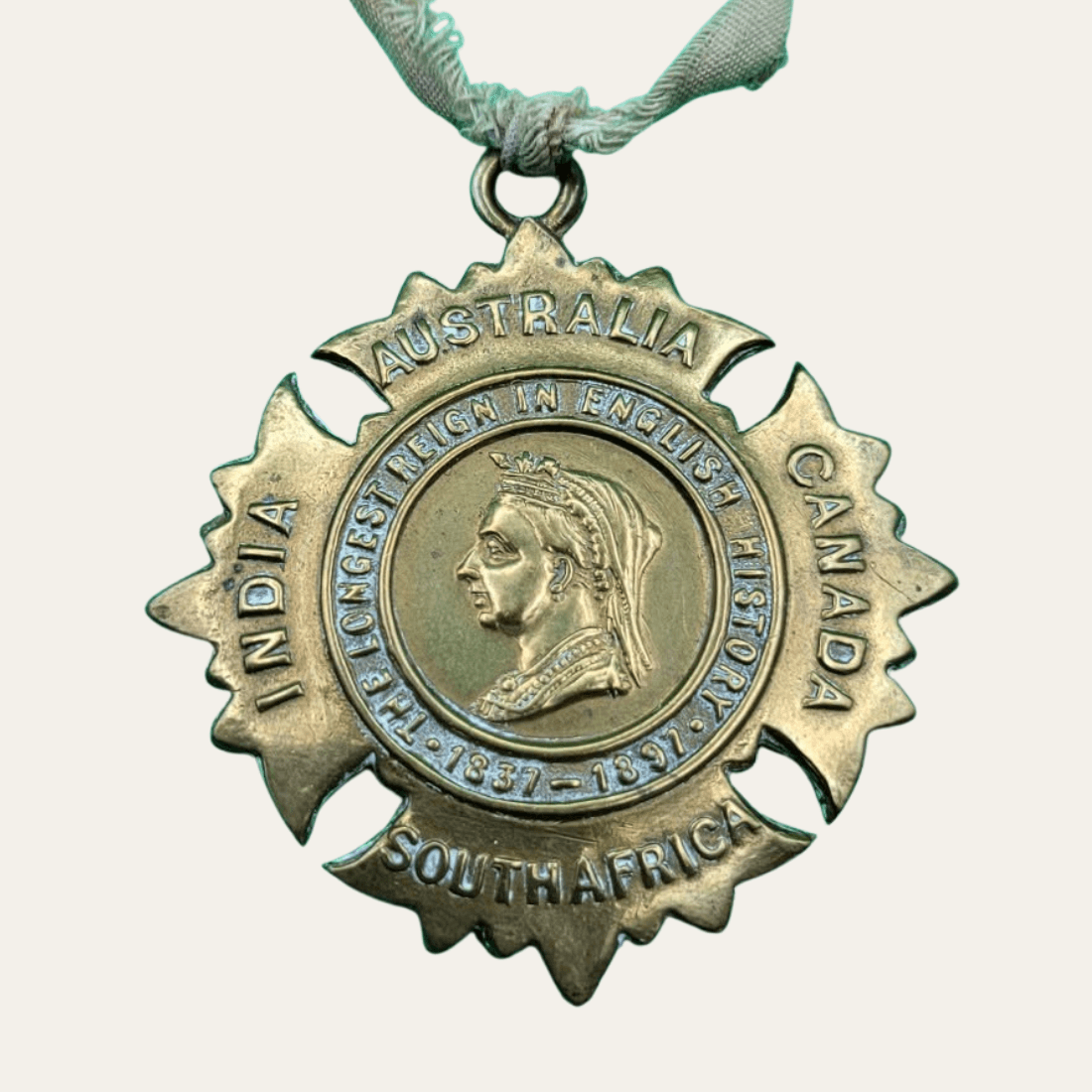 Reverse view of antique Queen Victoria Diamond Jubilee medal 1897