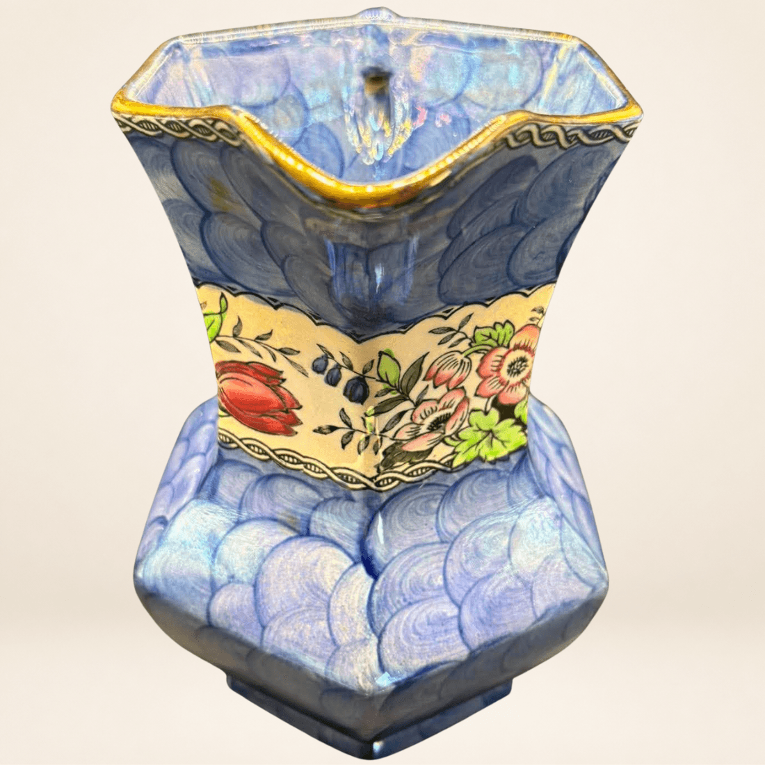 Back view of dark blue Maling lustreware jug with floral decoration