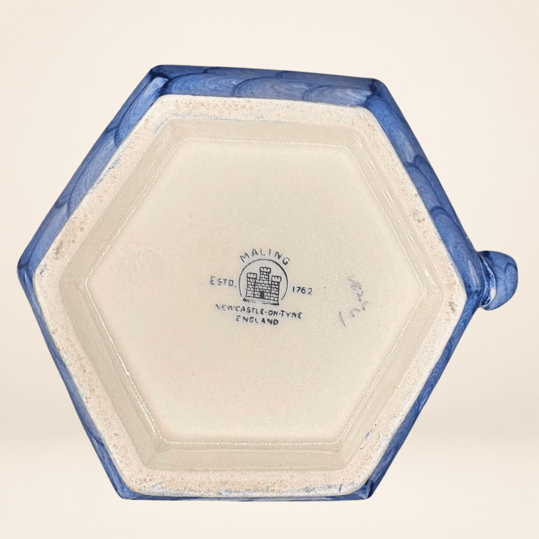Base of Maling jug with Newcastle-on-Tyne castle mark and pattern number 6563