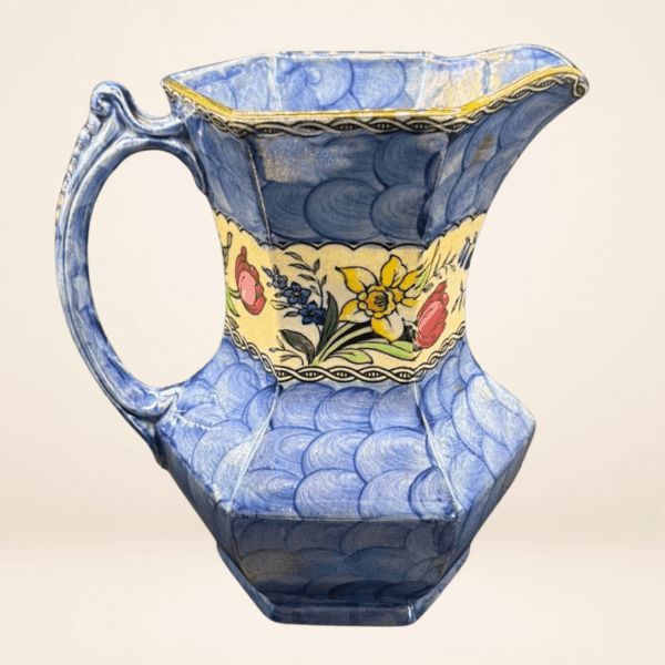 Maling Peony Rose jug in dark blue lustre with floral band and gilt rim